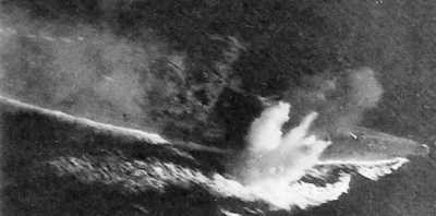 Bombs Score a Hit and a Near Miss on Musashi, October 1944
